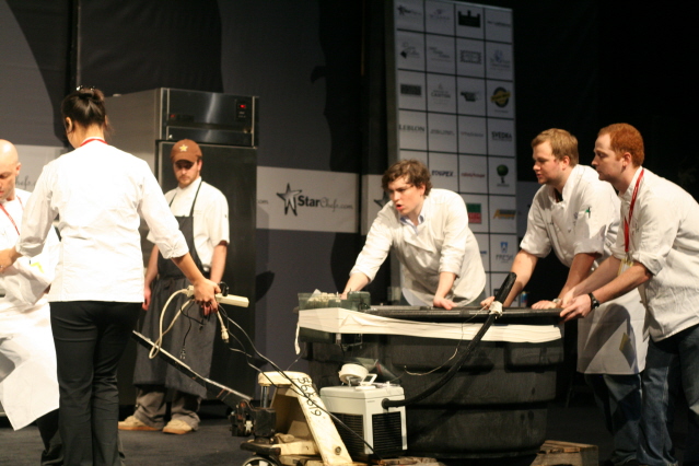 Mindy and interns rolling sea bass.