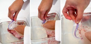 1 and 2. Submerge the bag and work out all the air. 3. Just before the last corner goes underwater, remove your finger and seal the bag completely.