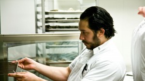 Carlo Mirarchi tending the oven.