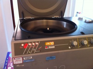 It's hard to tell whats happening inside a centrifuge when it is running. This one has its safety interlock defeated. NEVER DO THIS!